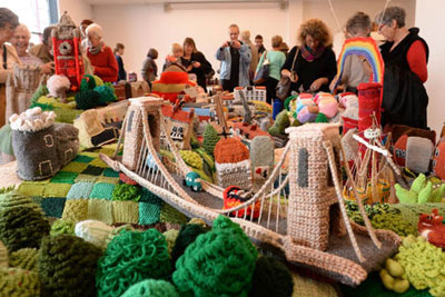 Image of the Bristol Suspension bridge all knitted in different coloured wools.