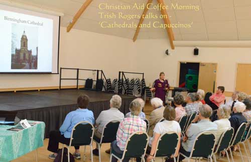 Image of stalls on the morning with pictures painted by the Art group and others.