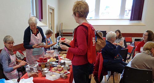 Image of people having refreshments at the Christian aid coffee morning.