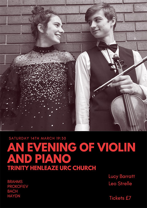 picture of Lucy and Leo holding a violin.