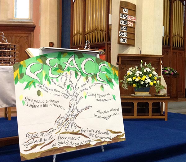 Peace board at the front of the church